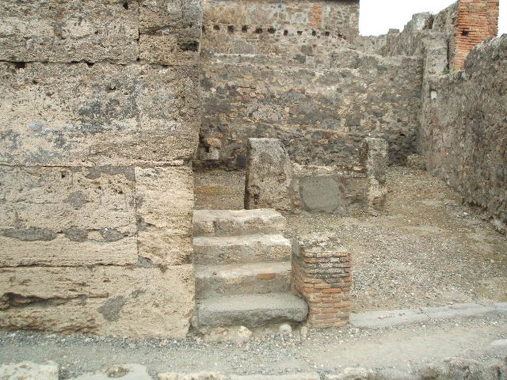 VI.1.11 Pompeii. May 2005. Entrance of steps to upper floor.