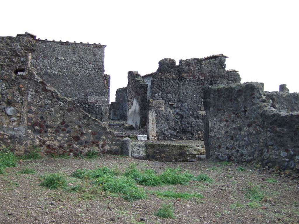 VI.1.22 Pompeii. December 2007. Looking east to entrance doorway on Vicolo di Narciso.