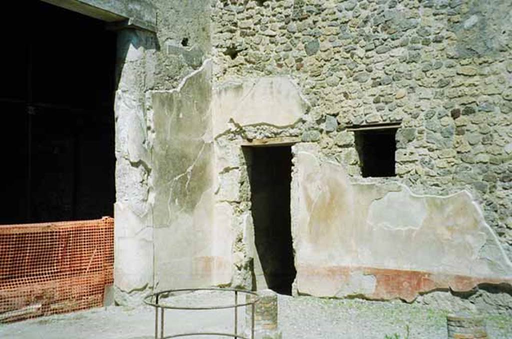 VI.2.4 Pompeii. June 2010. 
Doorway into triclinium/exedra, on left, and doorway to small corridor, linking main house with garden apartments, in centre. 
Photo courtesy of Rick Bauer.
