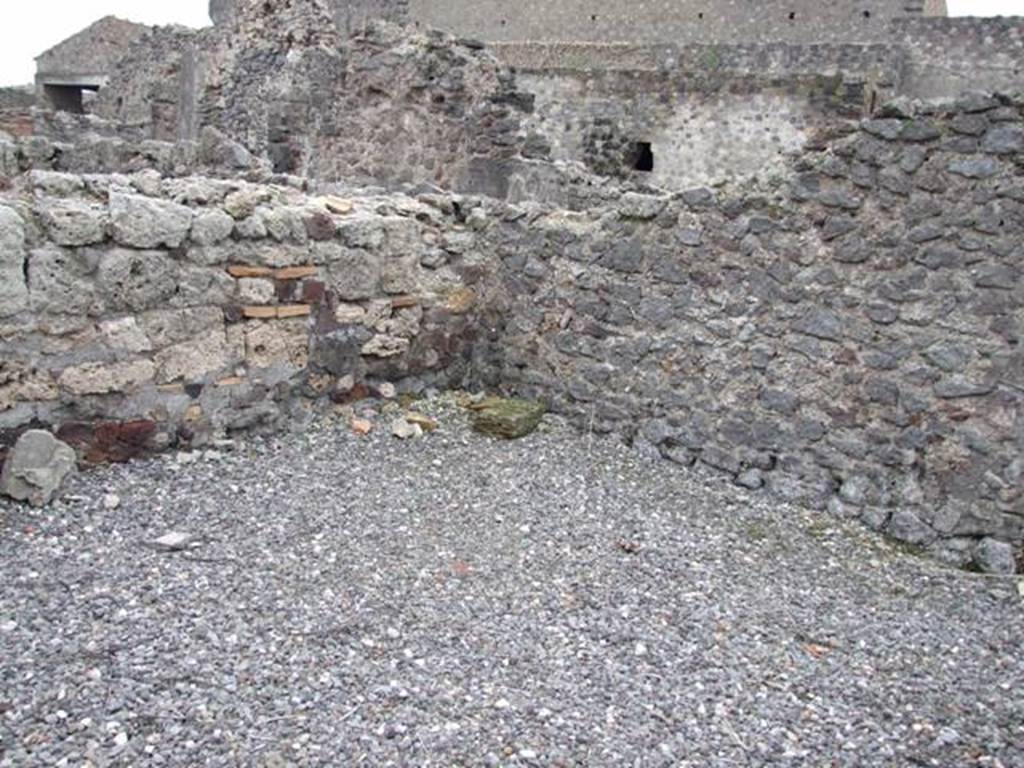 VI.2.10 Pompeii. December 2007. Looking south-east from entrance doorway across room to the south of entrance, under site of staircase of VI.2.9.
