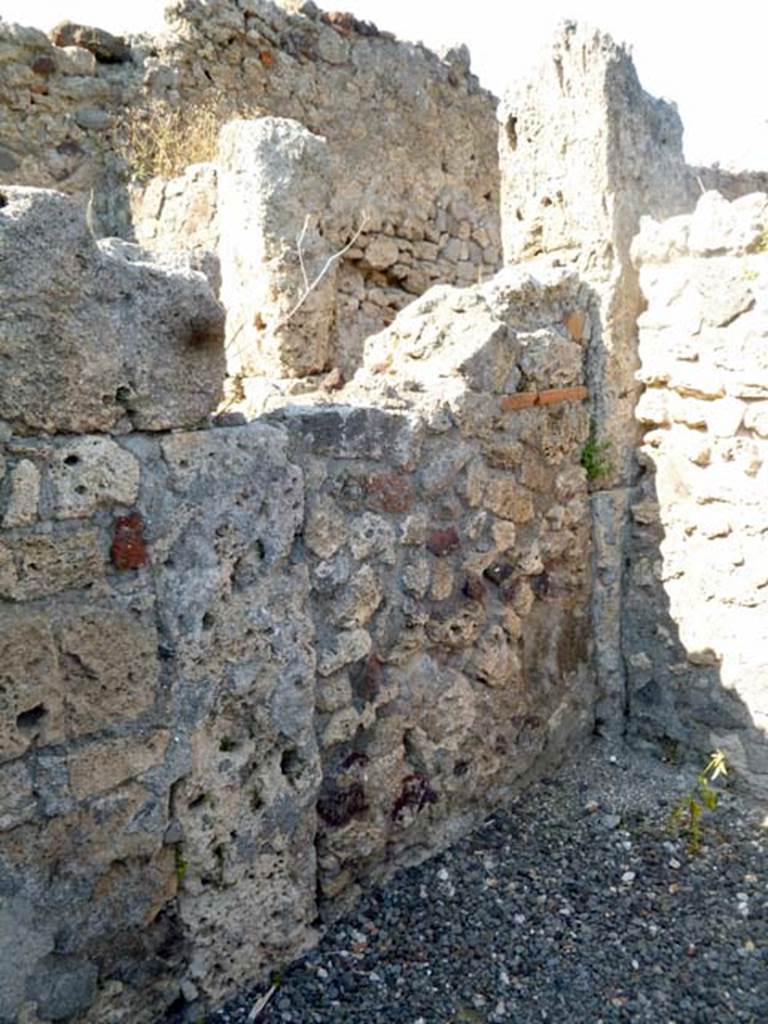 VI.2.10 Pompeii. May 2011. North-east corner of cubiculum on north side of entrance corridor. Above the wall at centre right, the east side of a cubiculum doorway can be seen. 
That cubiculum doorway is in the north-west corner of the atrium. Photo courtesy of Michael Binns.
