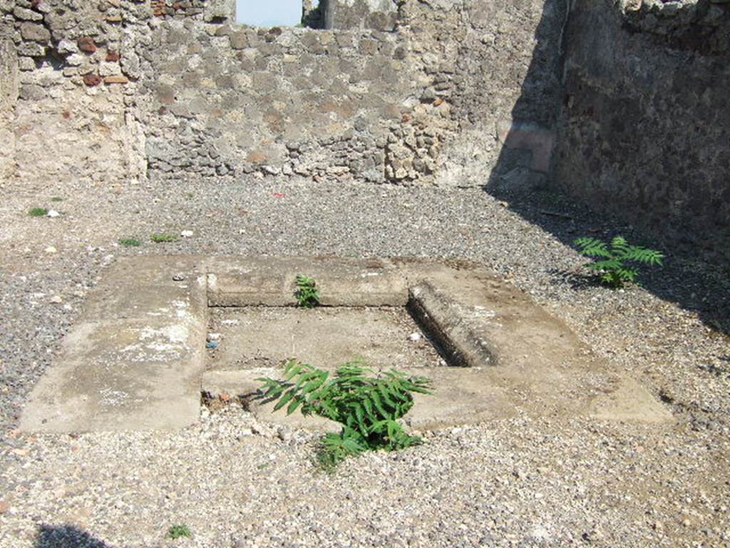 VI.2.11 Pompeii. September 2005. 
Looking east across atrium (3) and impluvium (4) to site of bricked up window.
