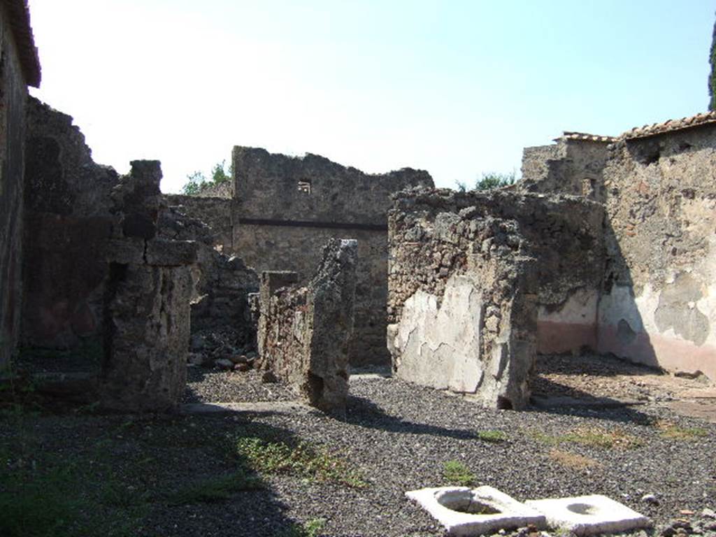 VI.2.13 Pompeii. September 2005. Looking west across atrium to front entrance corridor.