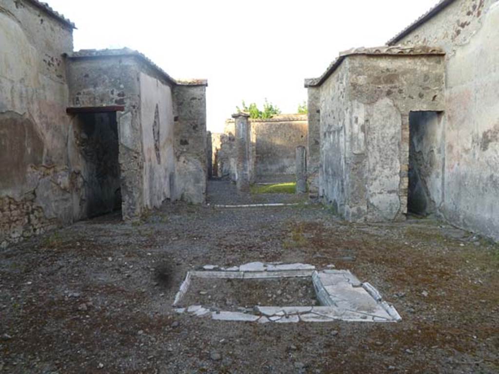 VI.2.16 Pompeii. May 2011. Looking east across impluvium in atrium.