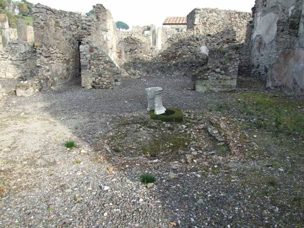 VI.2.20 and VI.2.17 Pompeii. December 2007.  Looking north at atrium of VI.2.17, showing corridor (top left) leading to rear of house at VI.2.20.
The tablinum is in the centre, and a small room, on the right.
