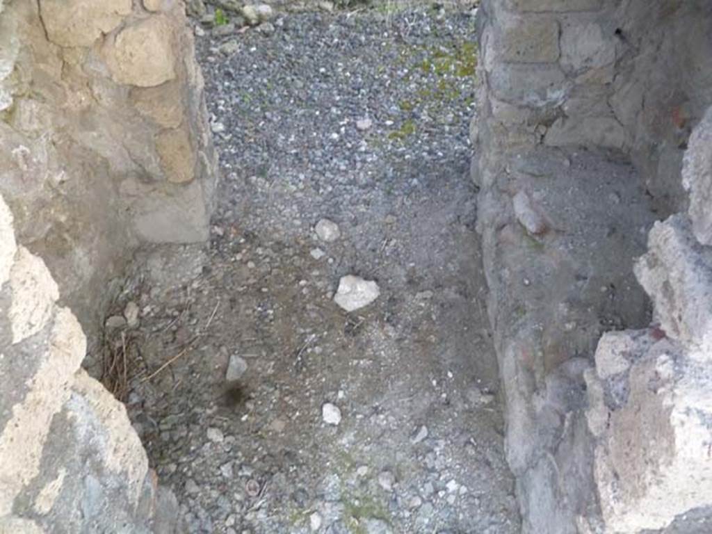 VI.2.20 Pompeii. May 2011. Looking south through corridor under the stone staircase, in south-west corner of large room.