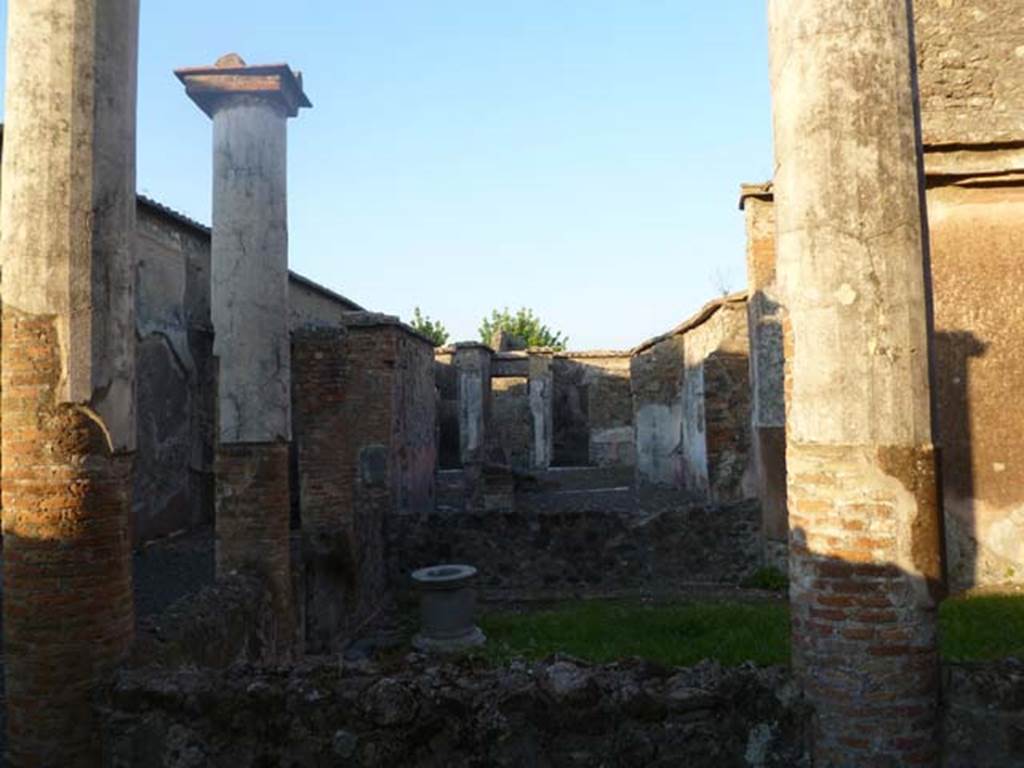 VI.2.22 Pompeii. May 2011. Looking east across peristyle from west portico, towards atrium and entrance at VI.2.22.