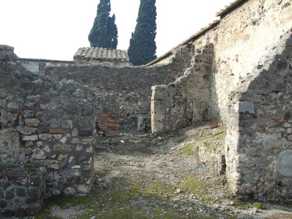 VI.2.23 Pompeii. December 2007. Looking west through entrance doorway.
According to Eschebach, on the right would have been the steps to the upper floor, above the latrine? See Eschebach, L., 1993. Gebudeverzeichnis und Stadtplan der antiken Stadt Pompeji. Kln: Bhlau. (p.160)
