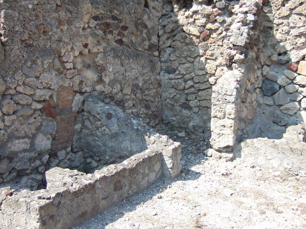 VI.2.26 Pompeii. September 2005. West side of workshop, looking north.