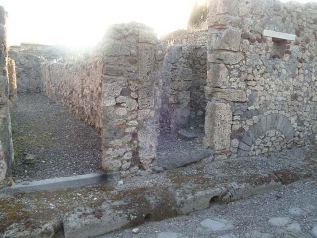 VI.2.27 Pompeii, on left. May 2011. Entrance doorways to both VI.2.27 and VI.2.26, on right. Looking west.