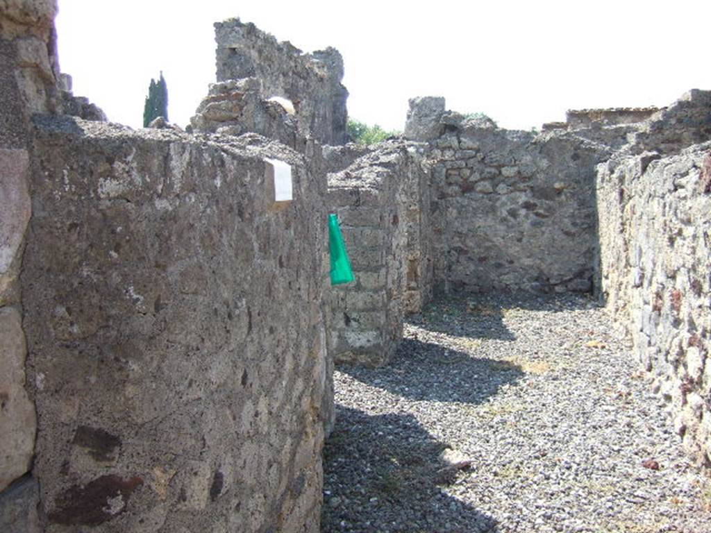 VI.2.27 Pompeii. September 2005.  Entrance corridor, with rooms only on one side. Looking west.