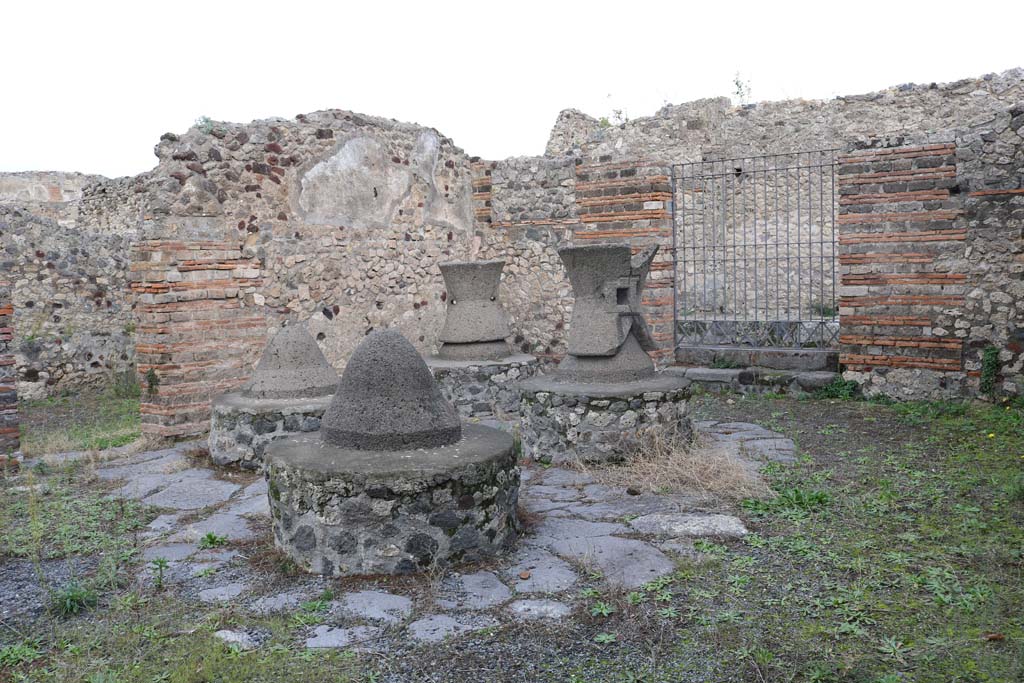 VI.3.3 Pompeii. December 2018. Room 7, looking north-east across mills towards entrance at VI.3.27. Photo courtesy of Aude Durand.