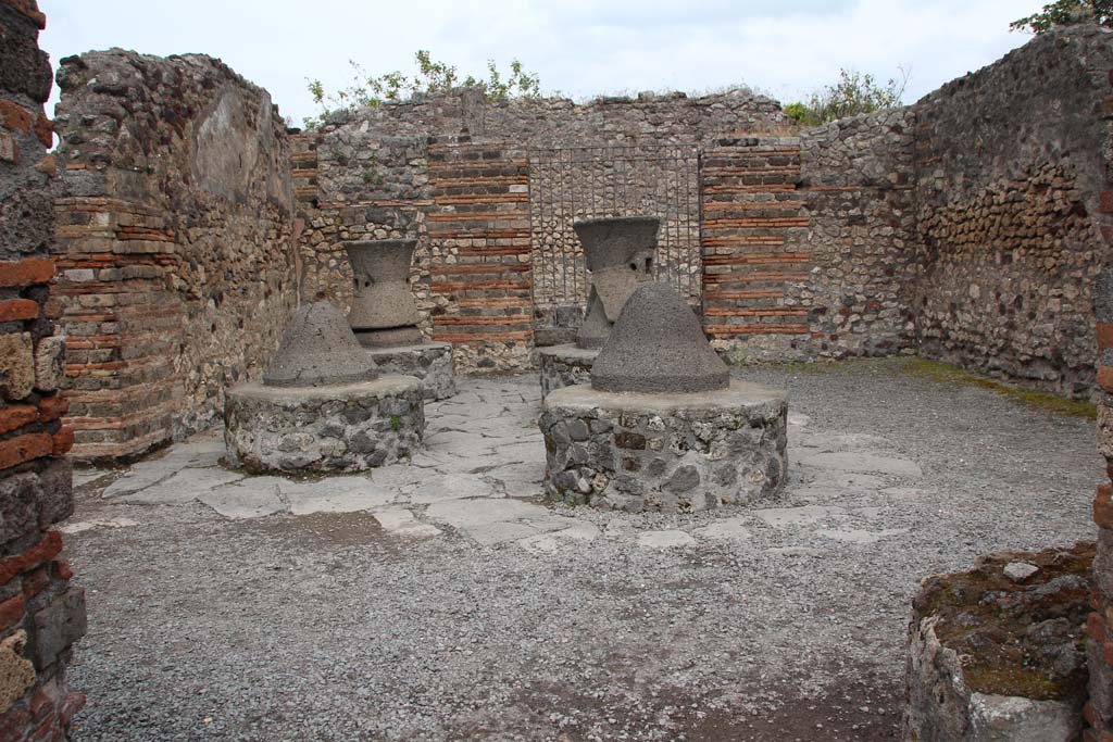 VI.3.3 Pompeii. April 2014. Room 7, looking east across mill-room towards entrance at VI.3.27. 
Photo courtesy of Klaus Heese.
