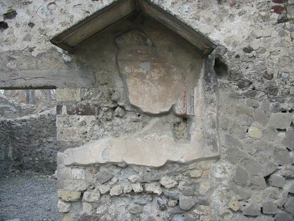 VI.4.4. Pompeii. May 2003. Painted lararium shrine on north wall. Photo courtesy of Nicolas Monteix.