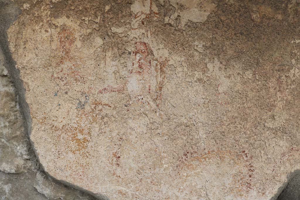 VI.4.4 Pompeii. December 2018. North wall, detail from remains of painted lararium shrine. Photo courtesy of Aude Durand.