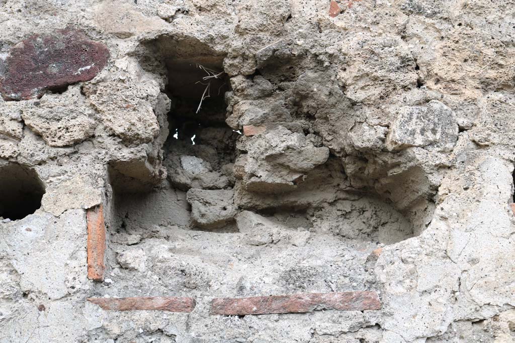 VI.4.4 Pompeii. December 2018. Feature in west wall of rear room Photo courtesy of Aude Durand.