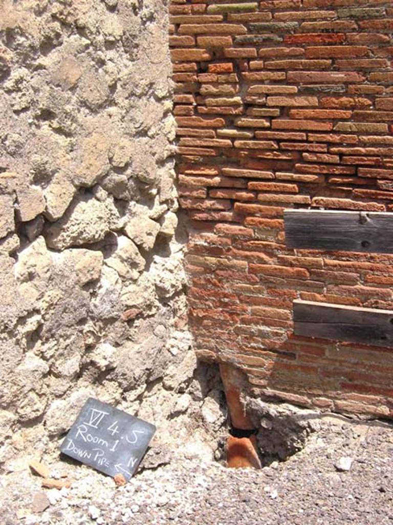 VI.4.5 Pompeii. July 2008. Downpipe in north-east corner of shop-room. Photo courtesy of Barry Hobson.