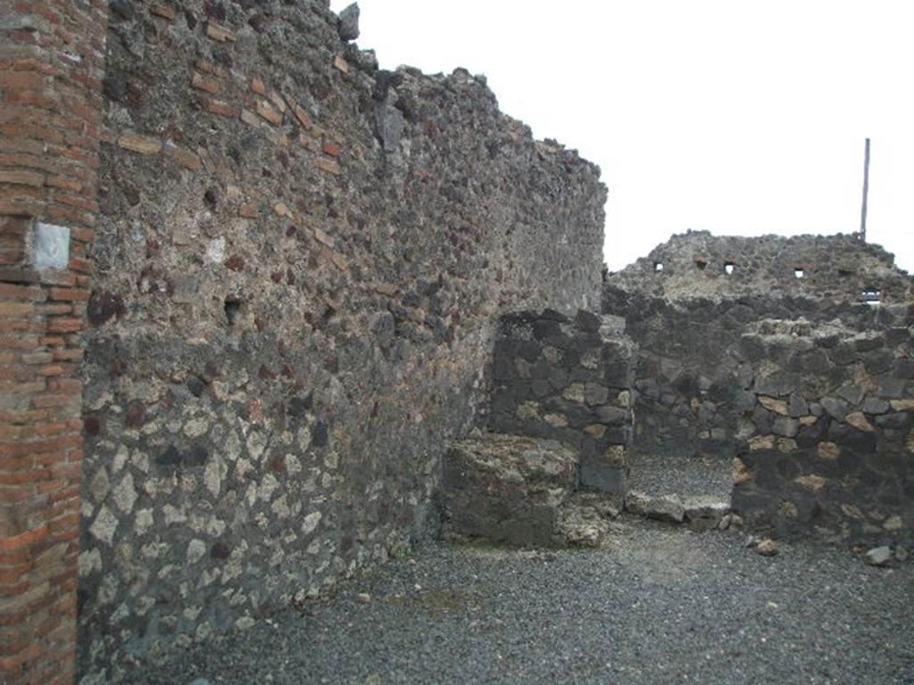 VI.4.6 Pompeii. May 2005. Looking west from entrance towards south-west corner with remains of two steps.