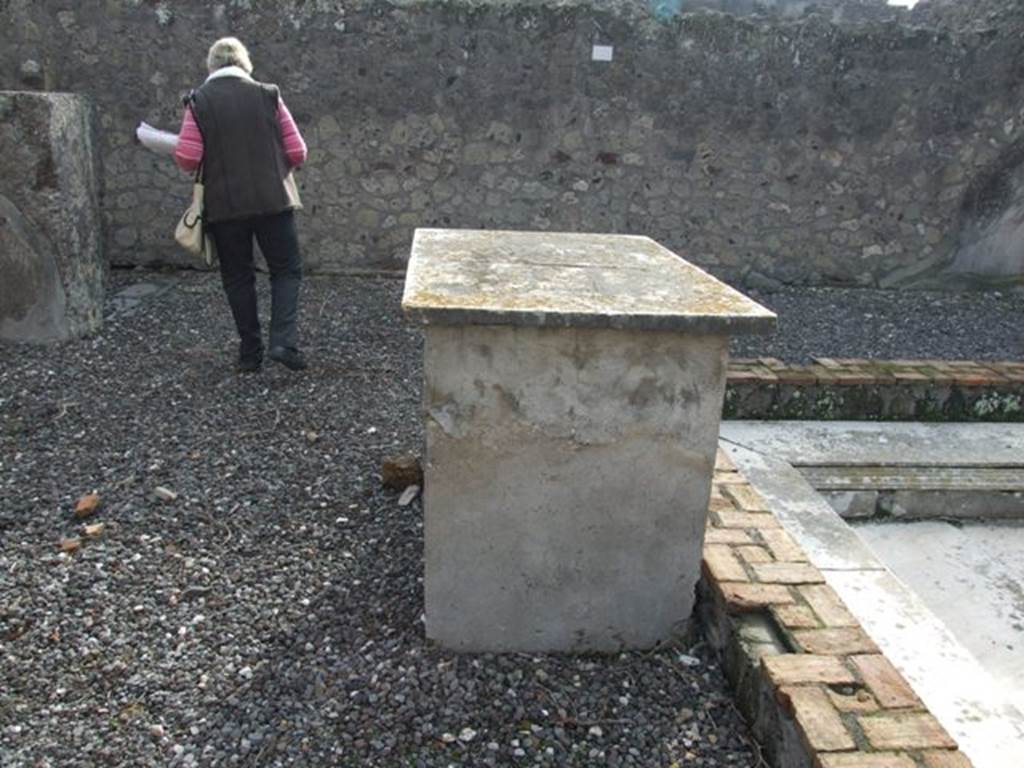 VI.5.3 Pompeii. December 2007. Looking south across atrium at table near impluvium.