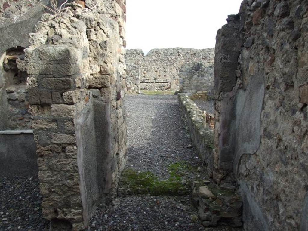 VI.5.3 Pompeii. December 2007. Looking east from doorway of room 8 towards rear entrance at VI.5.22.  