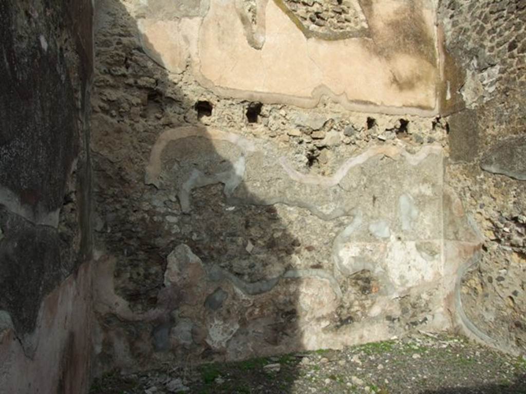 VI.5.3 Pompeii. December 2007. Room 14, north wall, showing holes for ceiling beams and upper room.