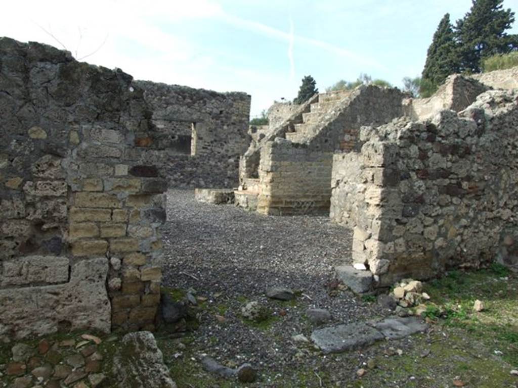 VI.5.3 Pompeii. December 2007. Looking west through entrance doorway at VI.5.22, into room 12 of VI.5.3.  