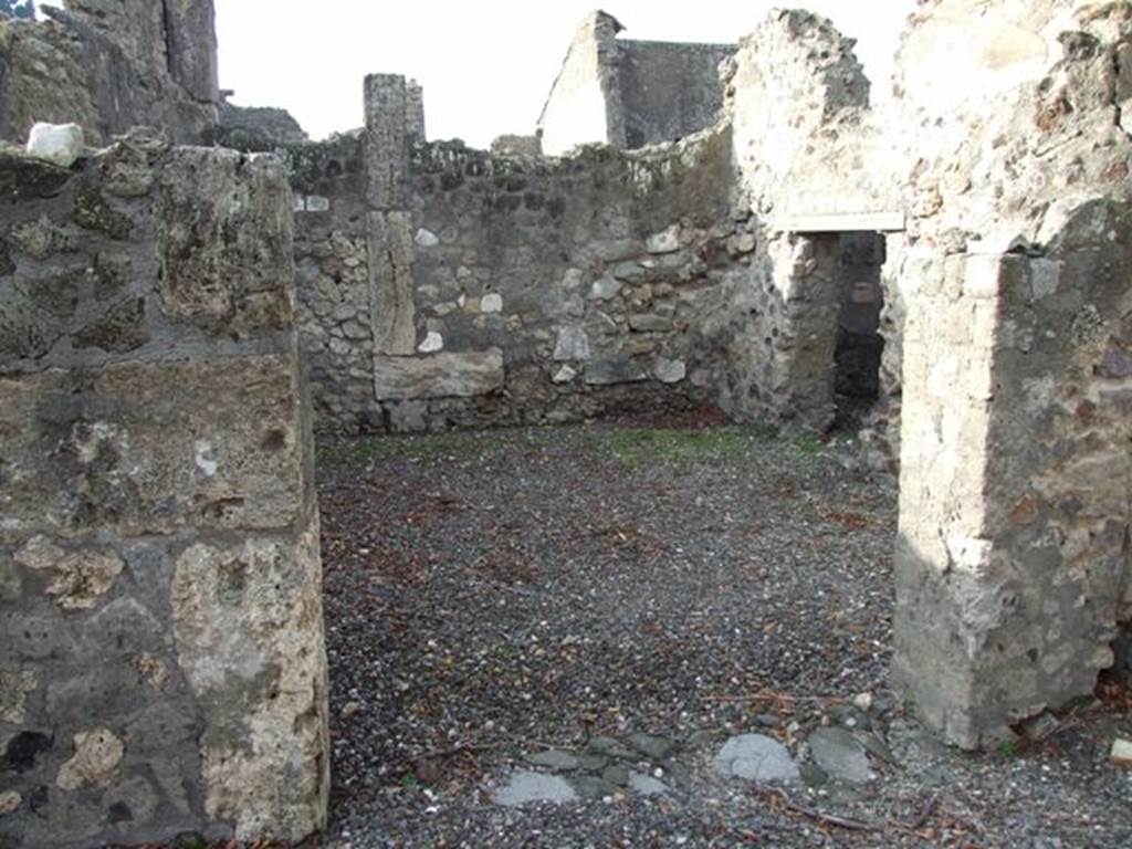 VI.5.4 Pompeii. December 2007.Doorway to room 8, oecus, looking towards north-west corner and doorway in north wall.