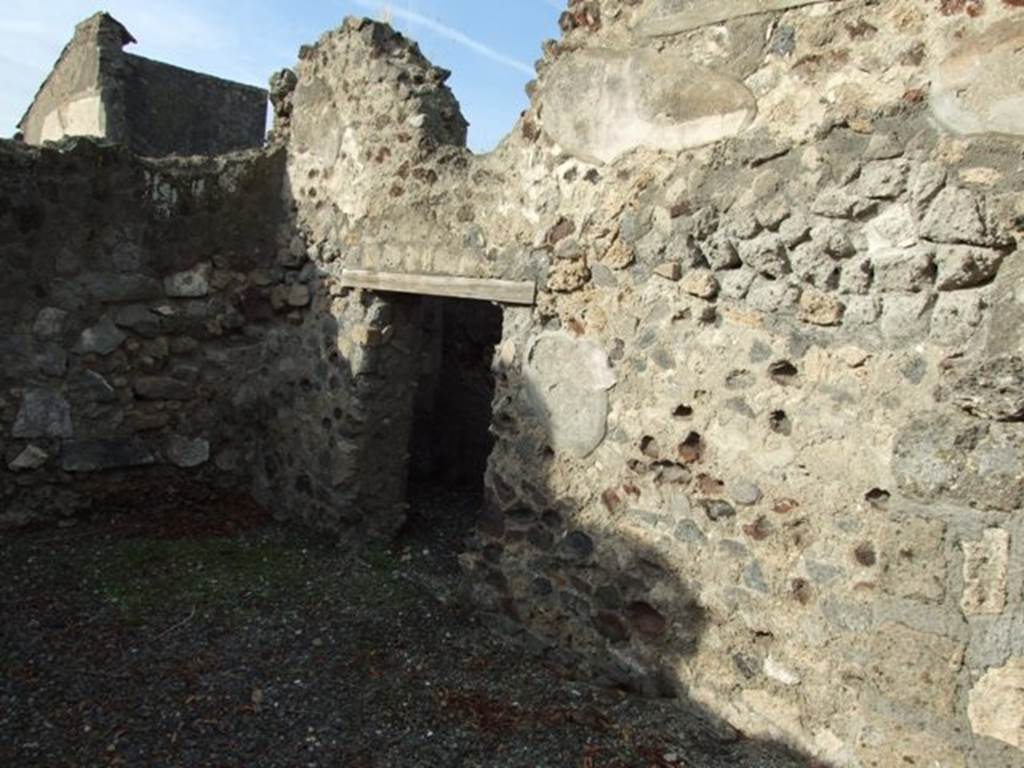 VI.5.4 Pompeii. December 2007. Doorway to small room or repository on north wall of room 8.  07.