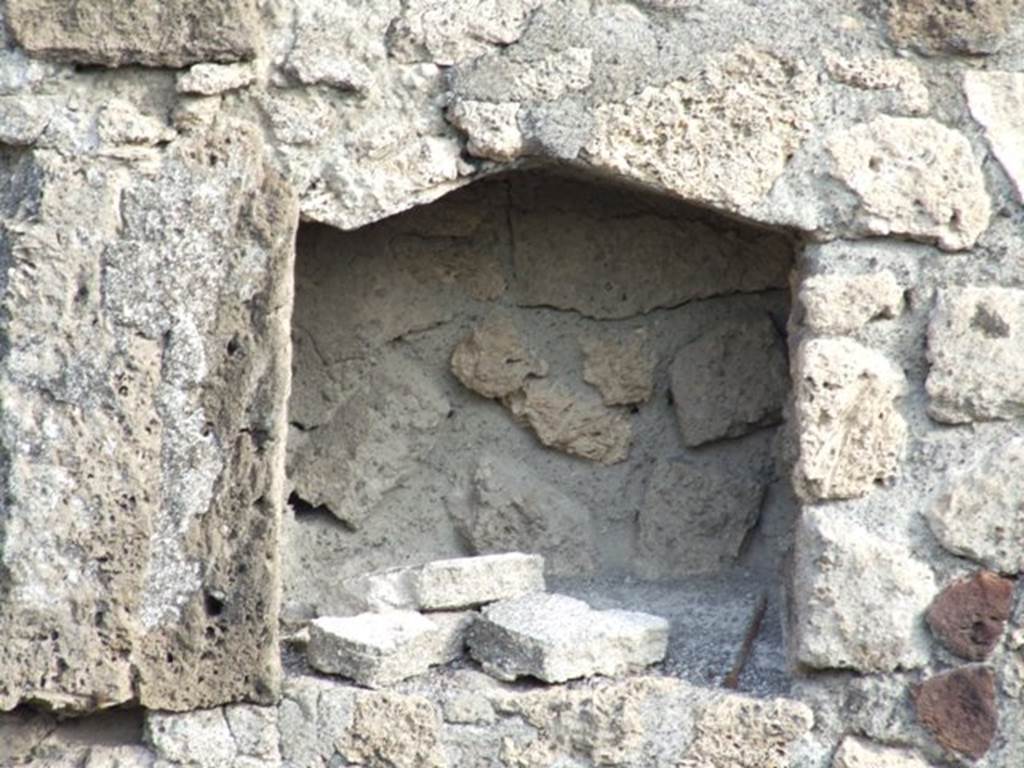 VI.5.5 Pompeii. December 2007. Niche in west wall of atrium.  
According to Boyce, in a large room opening off the east side of the peristyle was “un larario”  He gave the reference Ann. Inst., x, 1838, 186.
See Boyce G. K., 1937. Corpus of the Lararia of Pompeii. Rome: MAAR 14.  (p.46, no.153)
