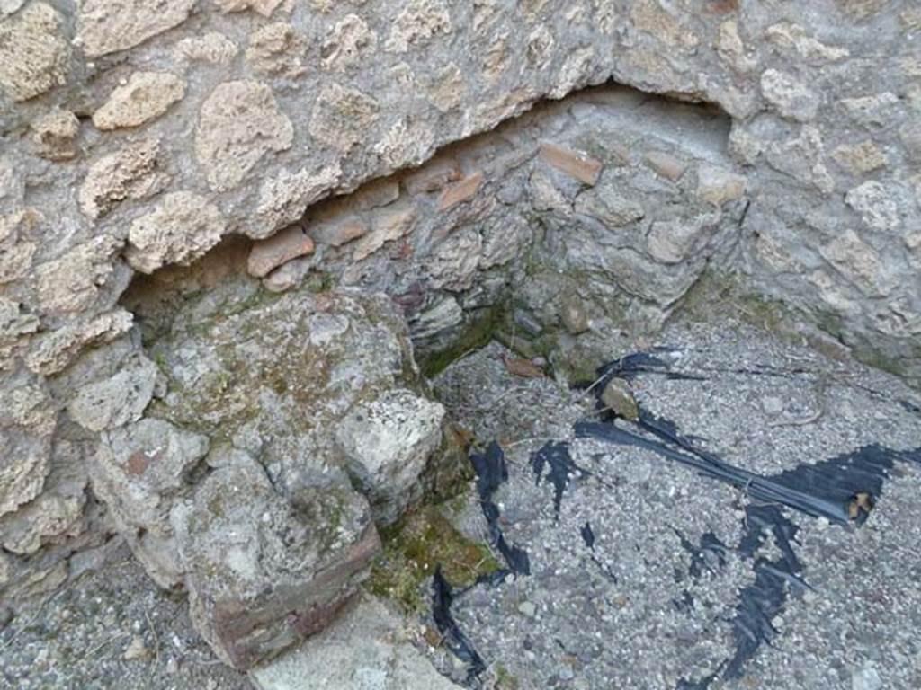 VI.5.8 Pompeii. May 2011. Looking towards north-east corner of latrine in kitchen.