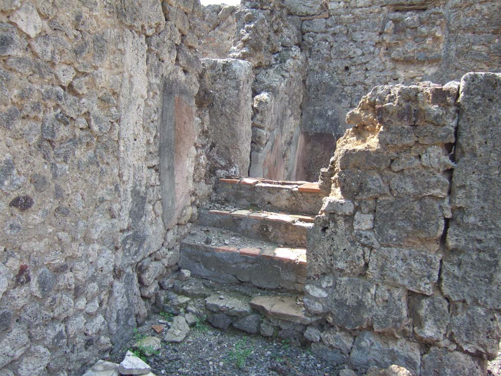 VI.5.9 Pompeii. September 2005. Looking west towards steps to upper floor.