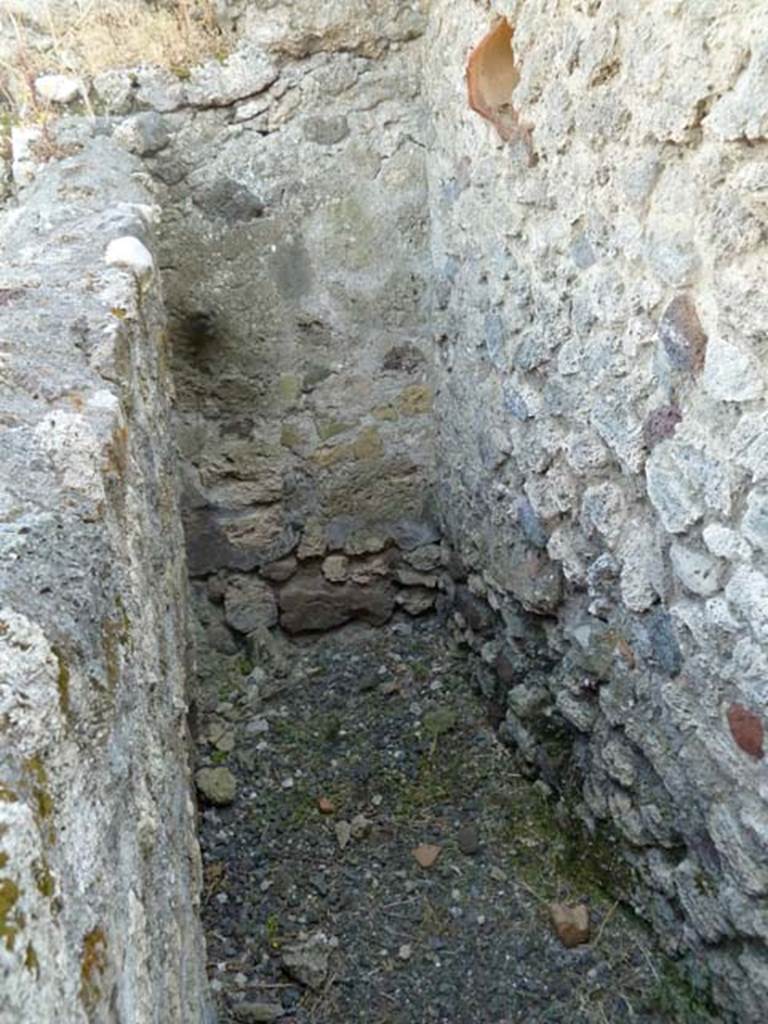 VI.5.9 Pompeii. May 2011. Looking south in area in room with stairs in south-east corner of atrium.