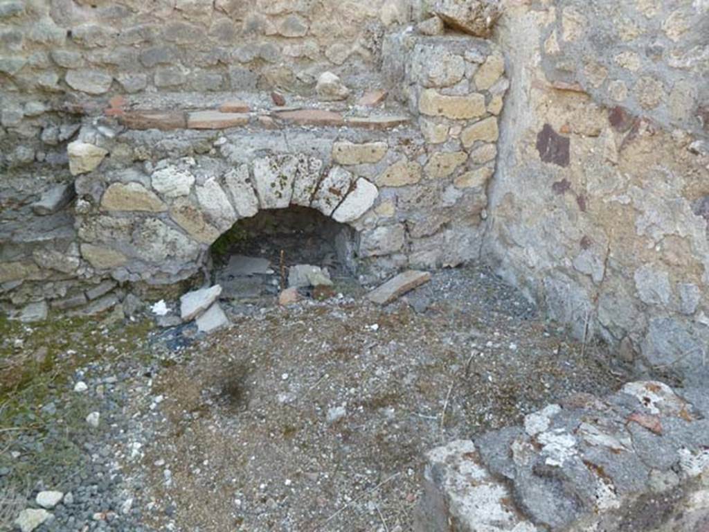 VI.5.10 Pompeii. May 2011. Room 4, hearth in kitchen.