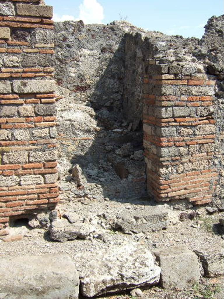 VI.5.11 Pompeii. September 2005. Stairs to an independent dwelling on the upper floor.

According to CTP, the north-west corner of the house at VI.5.14 was excavated in 1817, as well as the pseudoperistyle of VI.5.10 and atrium area of VI.5.9. The street wall at the north-west corner of the house at VI.5.14 collapsed and was reconstructed, which may provide the reason why Tascone, Mau and Eschebach, all indicated a rear doorway to VI.5.14, immediately south of this stairway, which, rightfully should have been assigned a number.  This doorway was delineated by Russos map of 1817, and later by Mazois, Fiorelli  Sorgente, and Zangemeister (1865).  Today the number VI.5.11 is not in situ but it has been assigned by the SANP to this staircase. 
See Van der Poel, H. B., 1981. Corpus Topographicum Pompeianum, Part V. Austin: University of Texas. (p.196-7)


