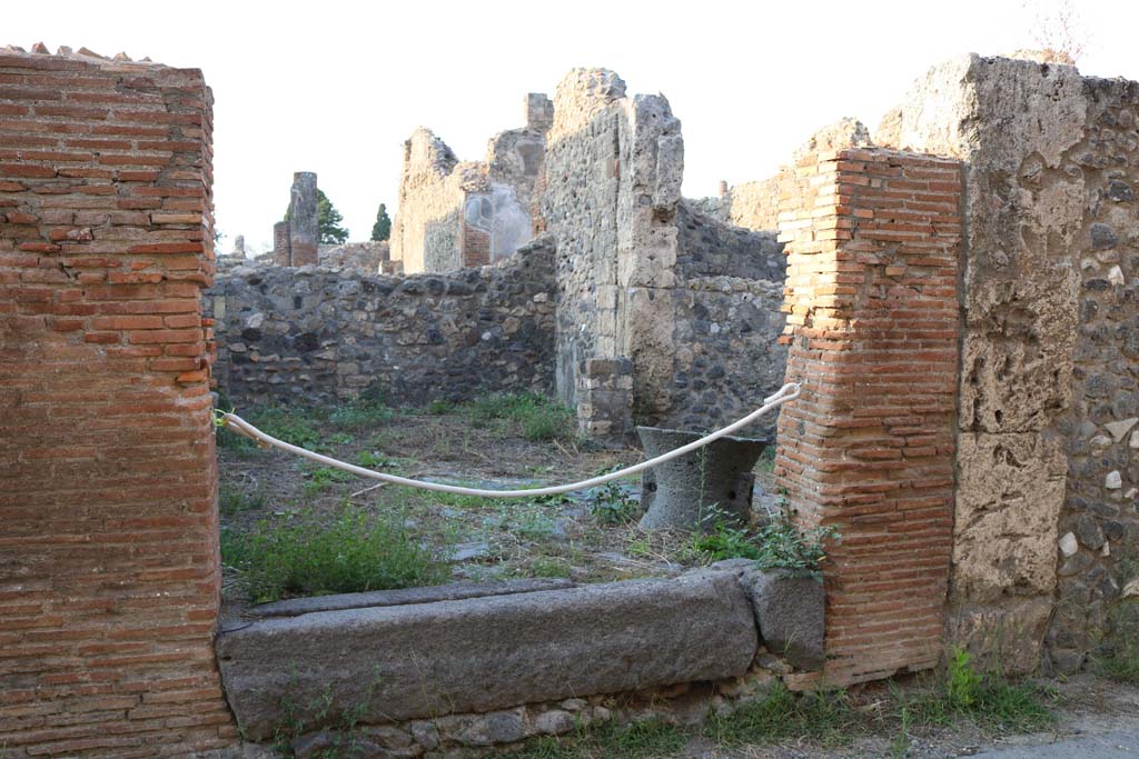 VI.5.15 Pompeii. December 2018. 
Looking north-east towards entrance doorway on Vicolo di Mercurio. Photo courtesy of Aude Durand.
