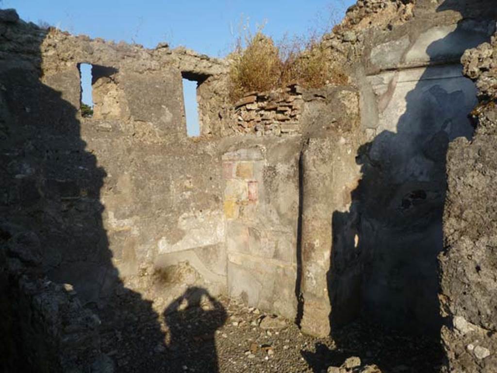 VI.5.19 Pompeii. May 2011. Room in south-east corner of atrium.
According to PPM, this room was a cubiculum with traces of floor and wall decorations remaining in the Ist Style.
See Carratelli, G. P., 1990-2003. Pompei: Pitture e Mosaici, IV. Roma: Istituto della enciclopedia italiana, (p.355).
