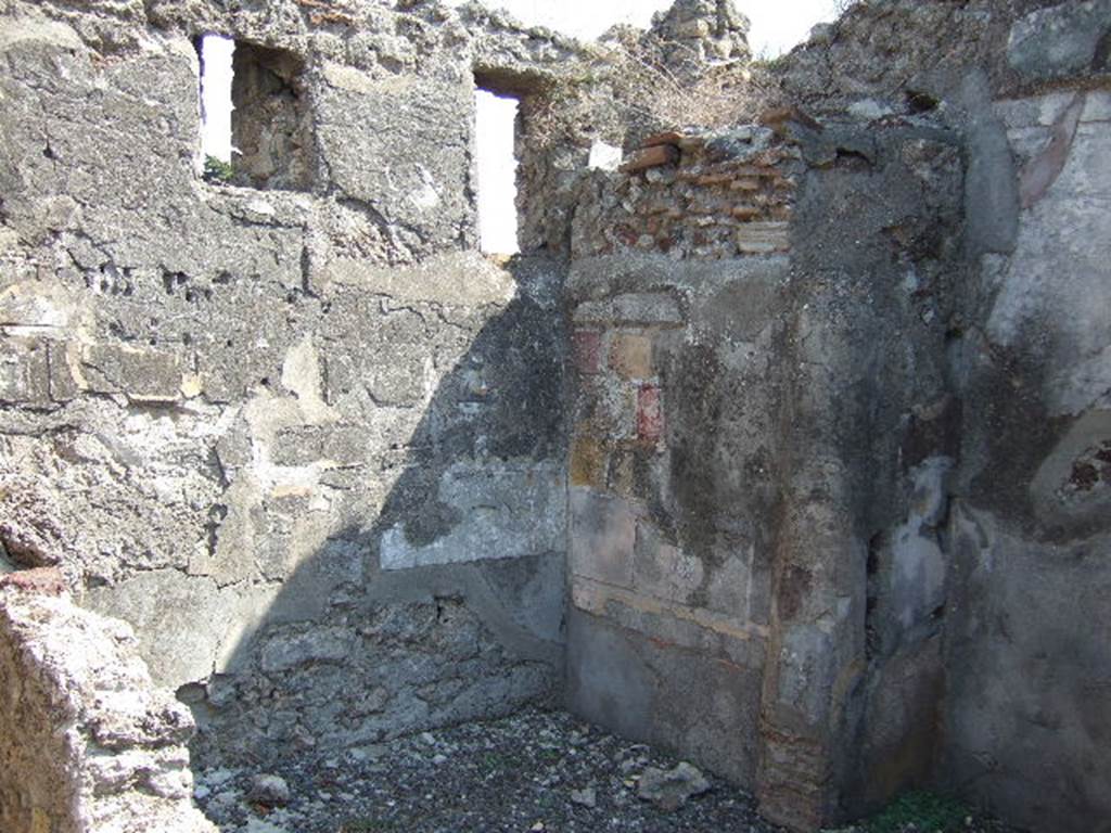 VI.5.19 Pompeii. September 2005. Looking south-east to cubiculum in corner of atrium.
