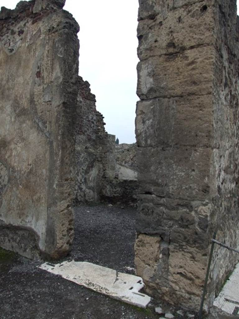 VI.6.1 Pompeii. December 2007. Doorway to room 5 on north-west side of atrium.