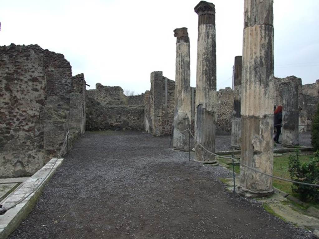 VI.6.1 House of Pansa.  December 2007.  Looking west along south side of the peristyle towards room 12.