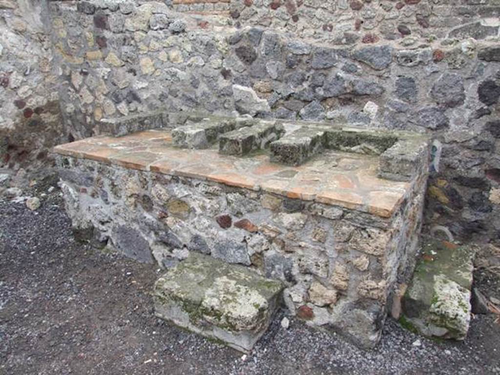 VI.6.1 Pompeii. December 2007. Room 16, hearth in kitchen area in north-west corner of peristyle.