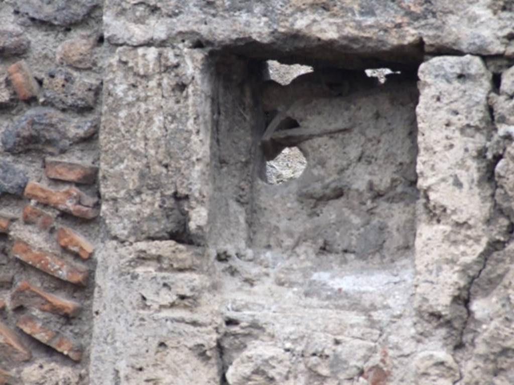 VI.6.3 Pompeii. December 2006. Niche in north wall of shop.