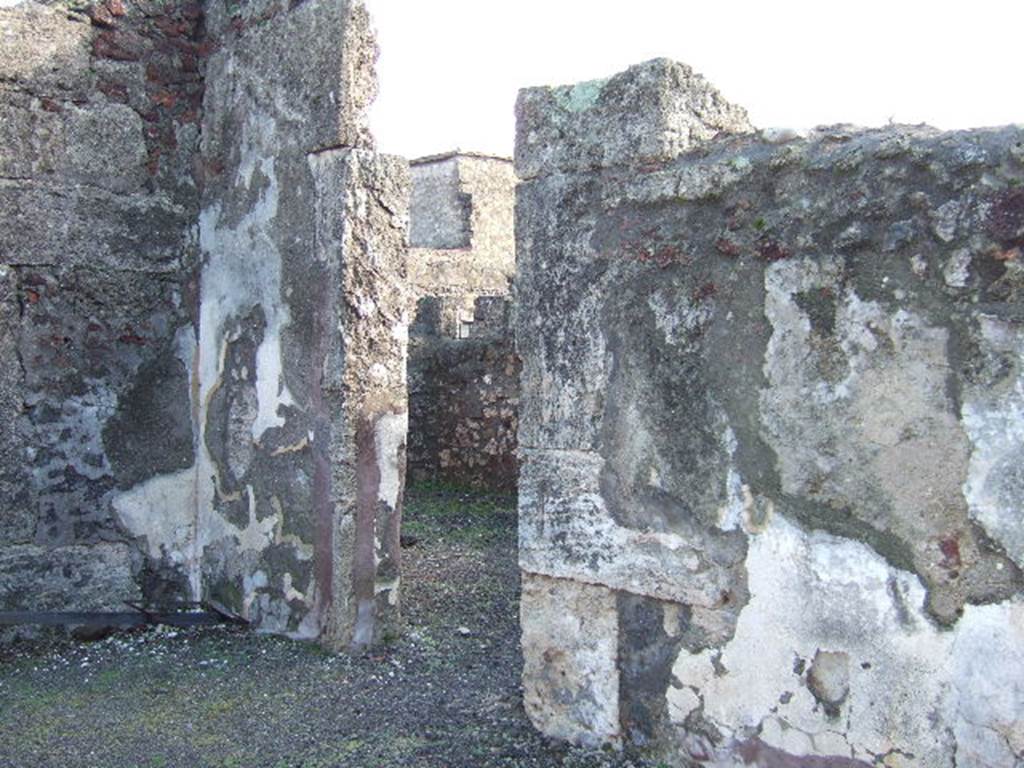 VI.6.9 Pompeii. December 2005. Doorway in south-east corner of atrium into triclinium.