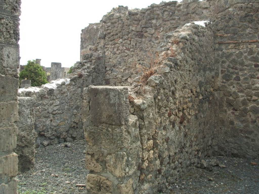 VI.6.10 Pompeii. May 2005. Looking south towards two rooms in south-west corner of atrium. A cubiculum is on the left and south wall of the tablinum is on the right.

