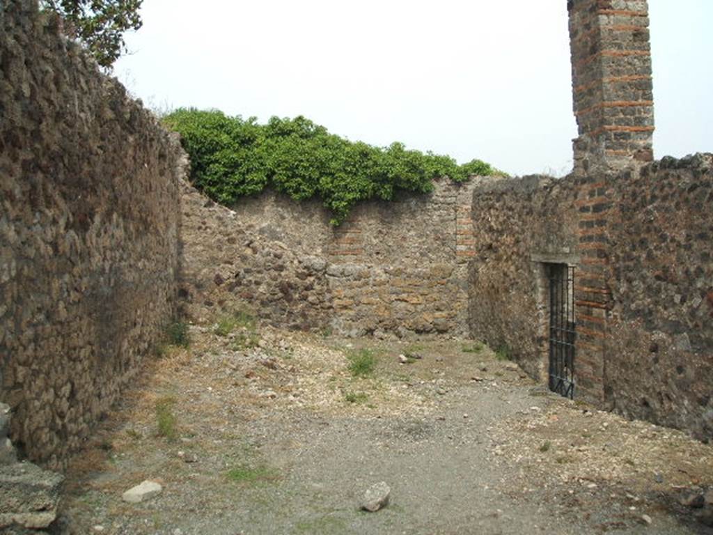 VI.6.13 Pompeii. September 2005. Looking east, in the south wall can be seen the doorway into the kitchen of VI.6.1.