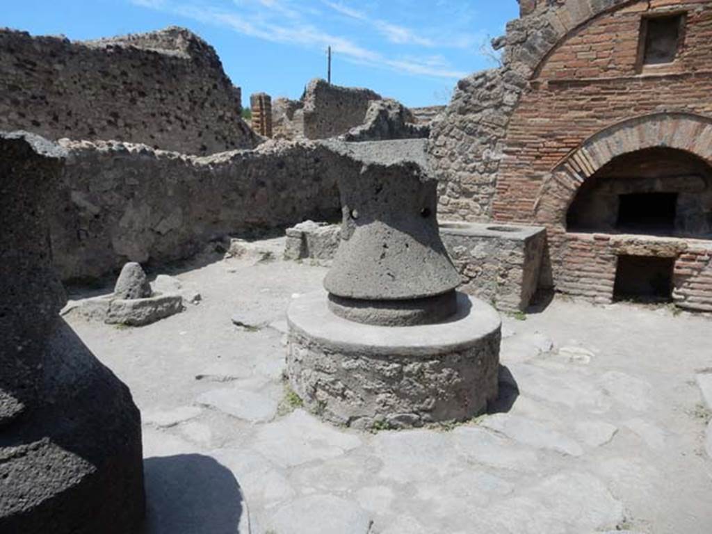 VI.6.17 Pompeii. May 2017. Looking north-west across bakery towards a rear room.
Photo courtesy of Buzz Ferebee.
