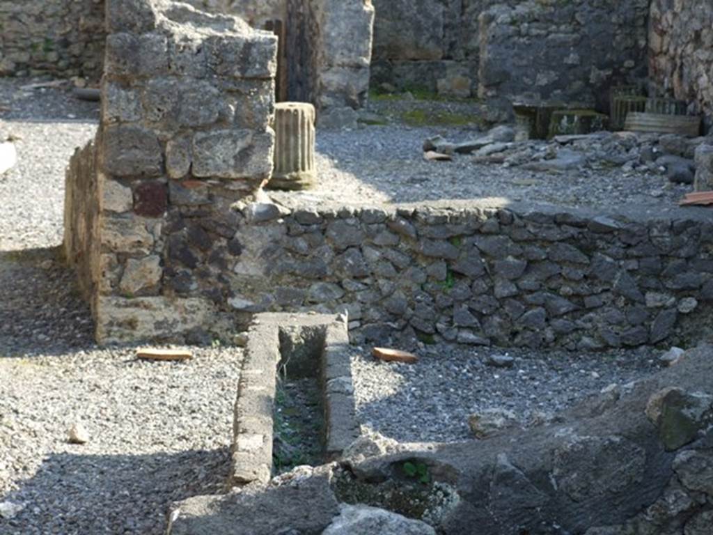 VI.7.7 Pompeii. March 2009.  Rear wall of tablinum, with window onto south portico and garden area. Looking south. According to Jashemski, the garden (excavated in 1835) at the rear of the tablinum had a roofed passageway on the south and east. She wrote, Fiorelli had said these were supported by two brick columns which were joined by a low wall.
This low wall enclosed the garden on the south and east. The top of the low wall contained a planting space. The large window in the tablinum overlooked the garden area. See Jashemski, W. F., 1993. The Gardens of Pompeii, Volume II: Appendices. New York: Caratzas. (p.129)
