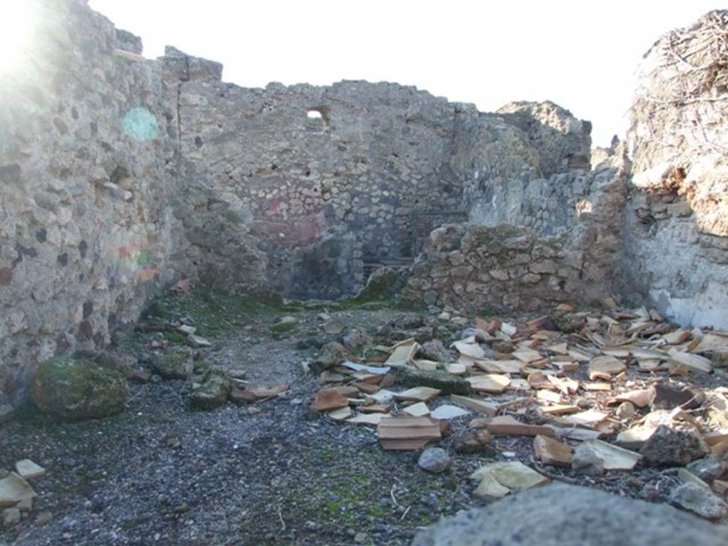 VI.7.11 Pompeii. December 2007.  Remains of room in north-west corner, entered through doorway from rear room. Looking west.
