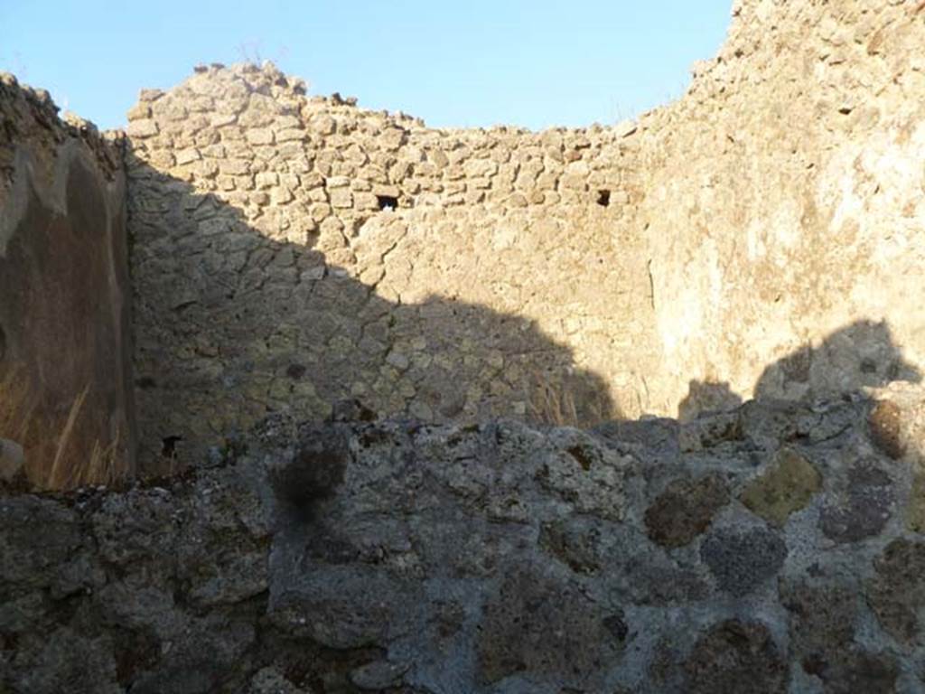 VI.7.15 Pompeii. May 2011. Upper rear of east wall of room in north-west corner, taken from VI.7.1 (lower wall).