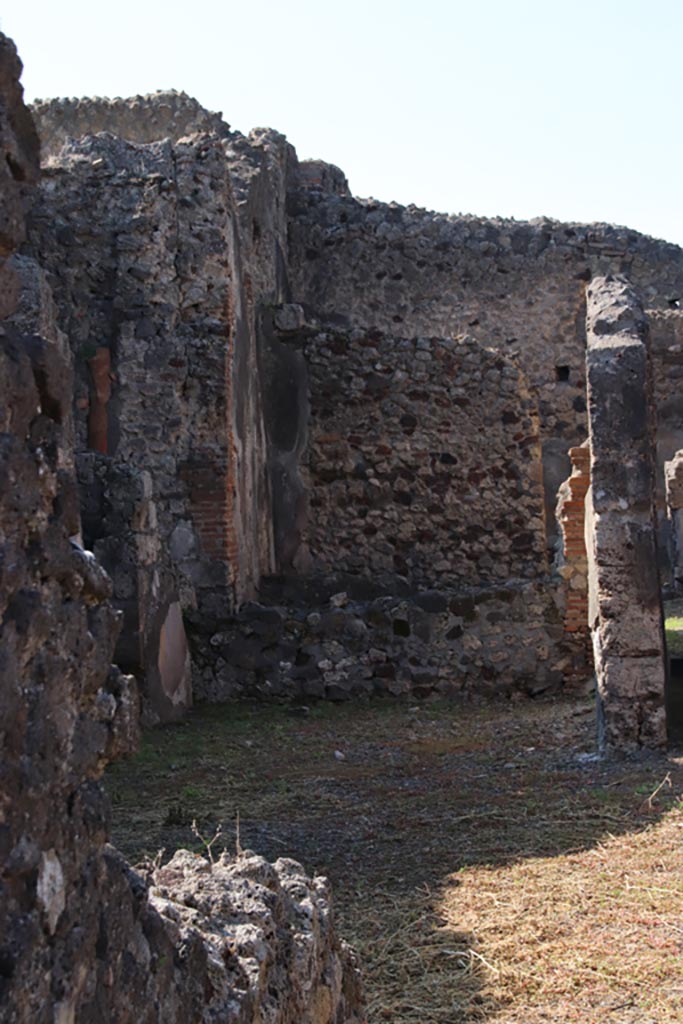 VI.7.16 Pompeii. October 2022. 
Looking west towards room in south-west corner of atrium. Photo courtesy of Klaus Heese.
