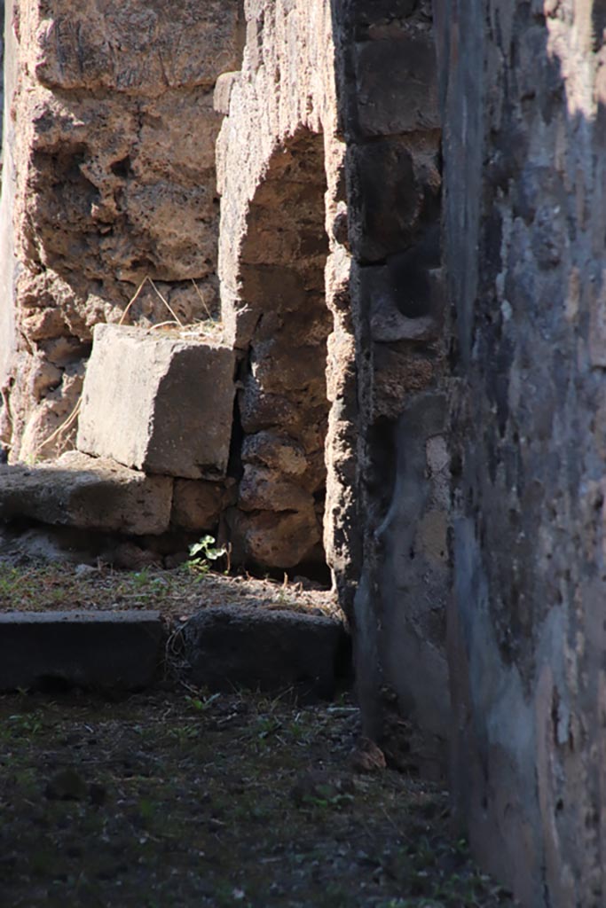 VI.7.16 Pompeii. October 2022. 
Looking west to recess on north side of corridor to rear. Photo courtesy of Klaus Heese.
